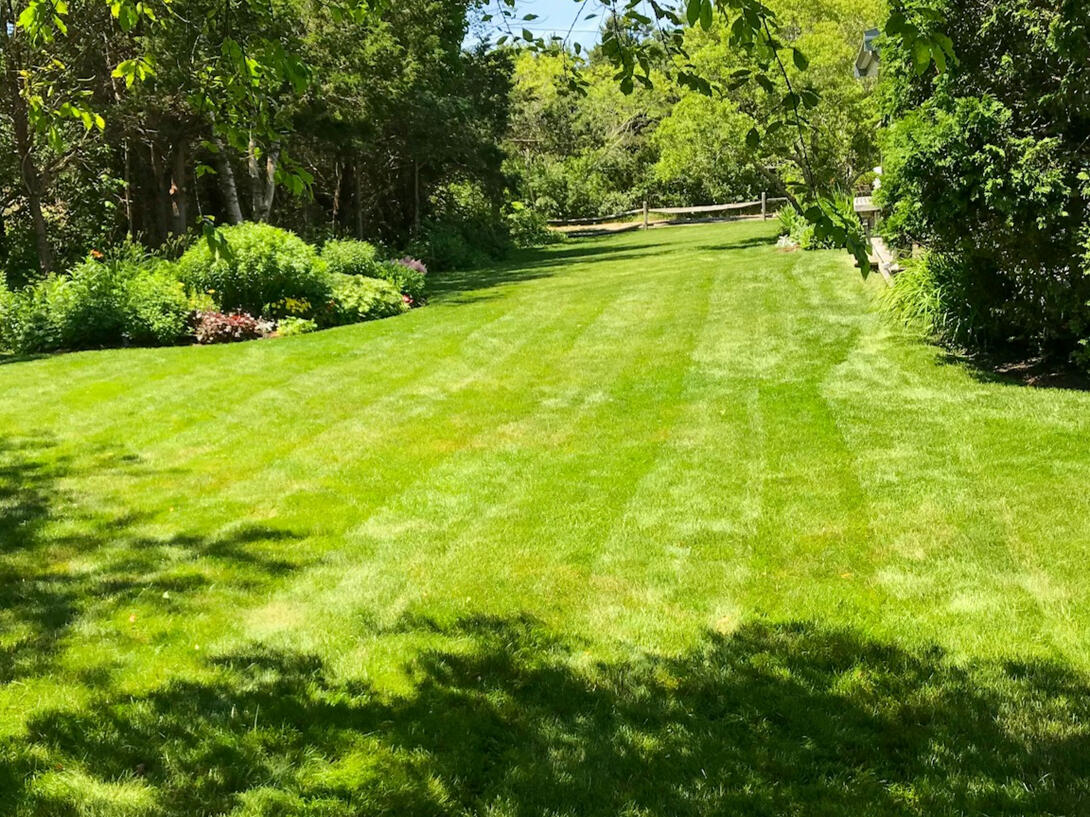 Chardon, OH Yard by CT Landscaping Mowed and Groomed Backyard in Chardon Ohio